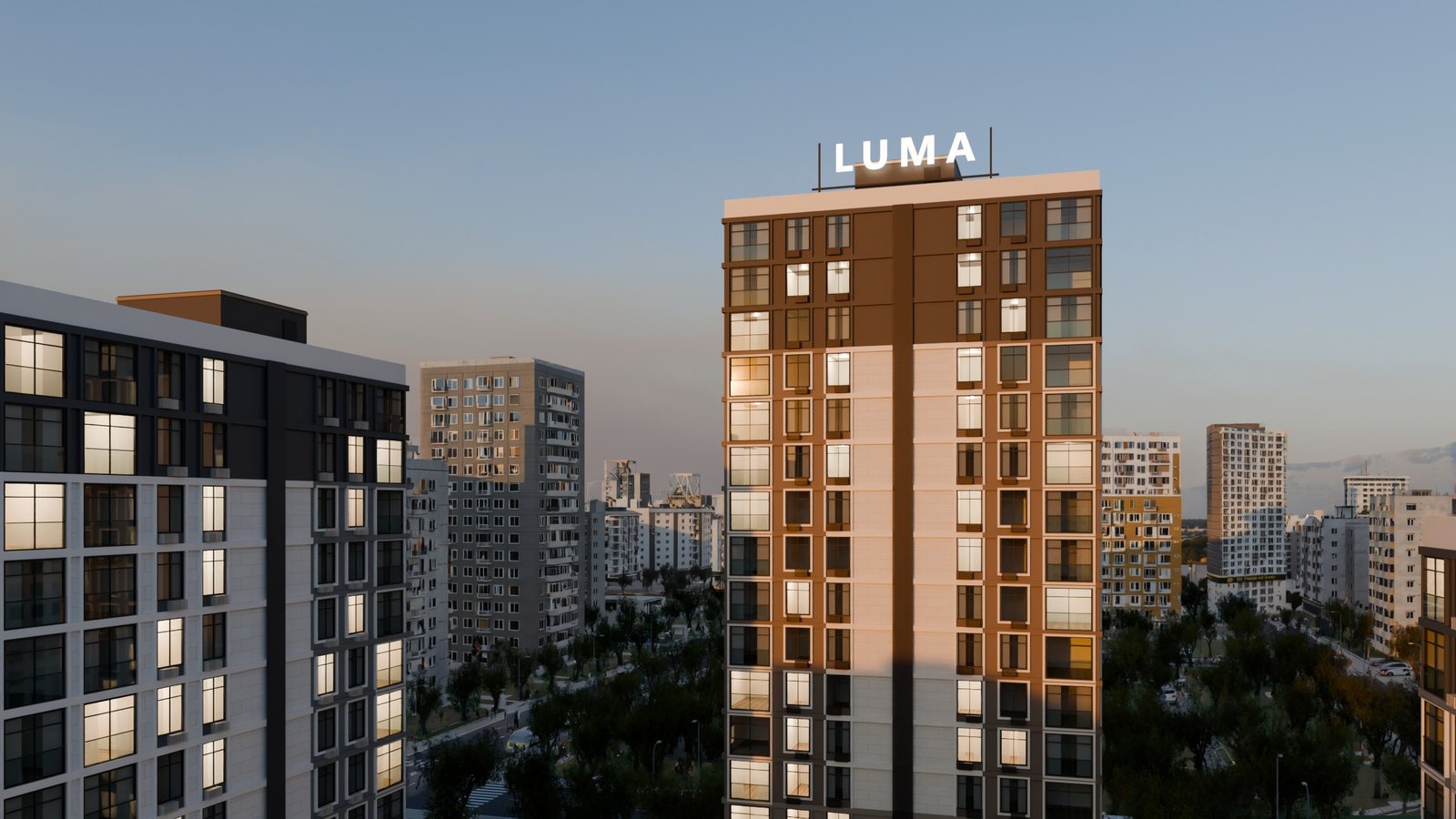 Башня LUMA в сумерках: в части квартир горит свет, небо после заката